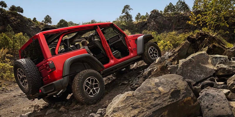4x4 Jeep climbing rocks
