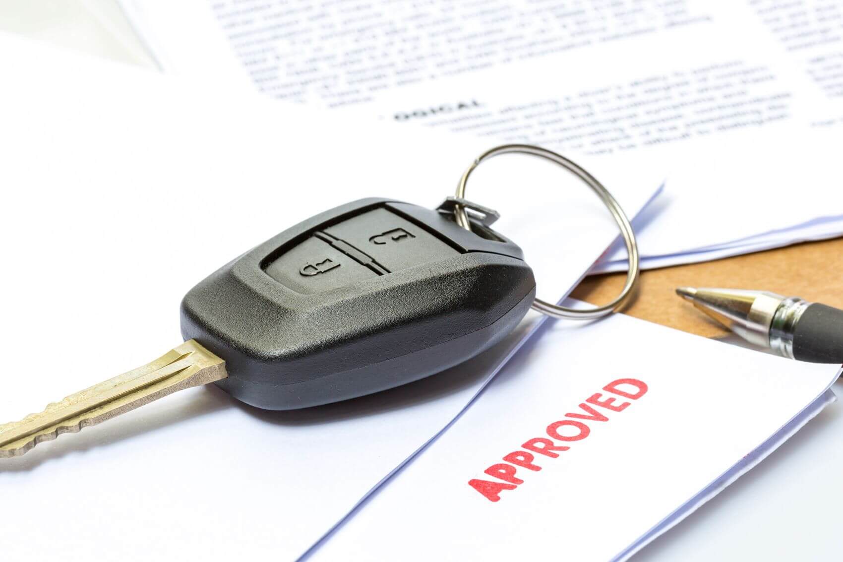 Car keys and approved stamp